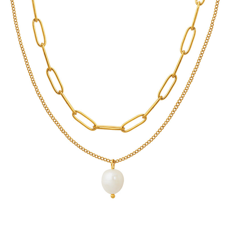 A gold-colored stainless steel women's necklace with a single bead pendant.