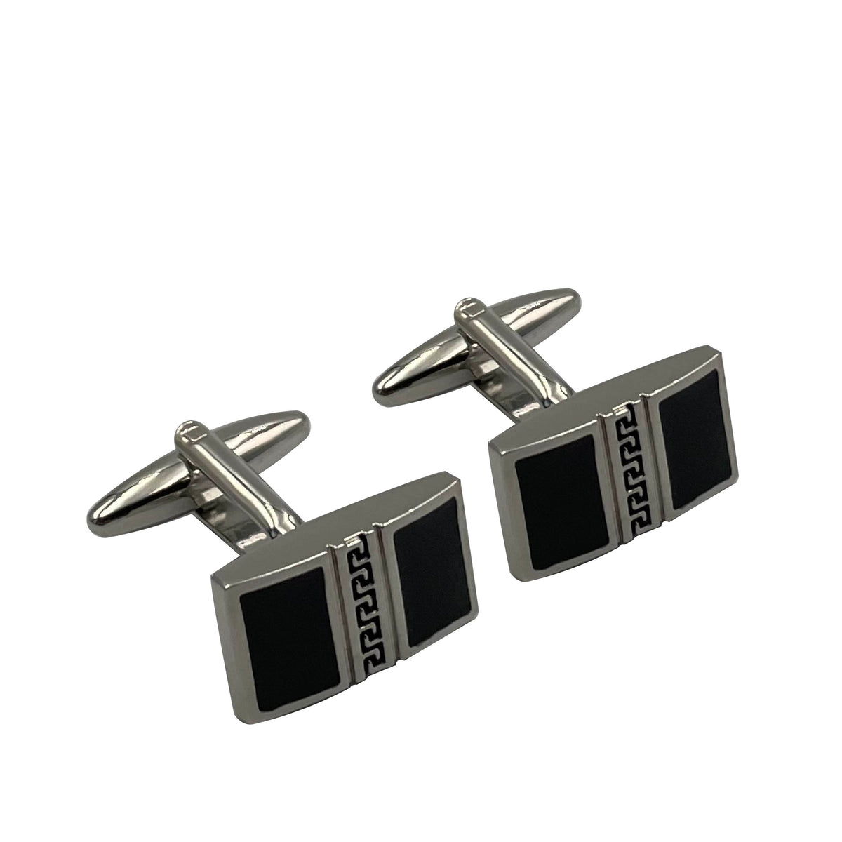 A pair of silver and black enamel cufflinks with a geometric pattern.