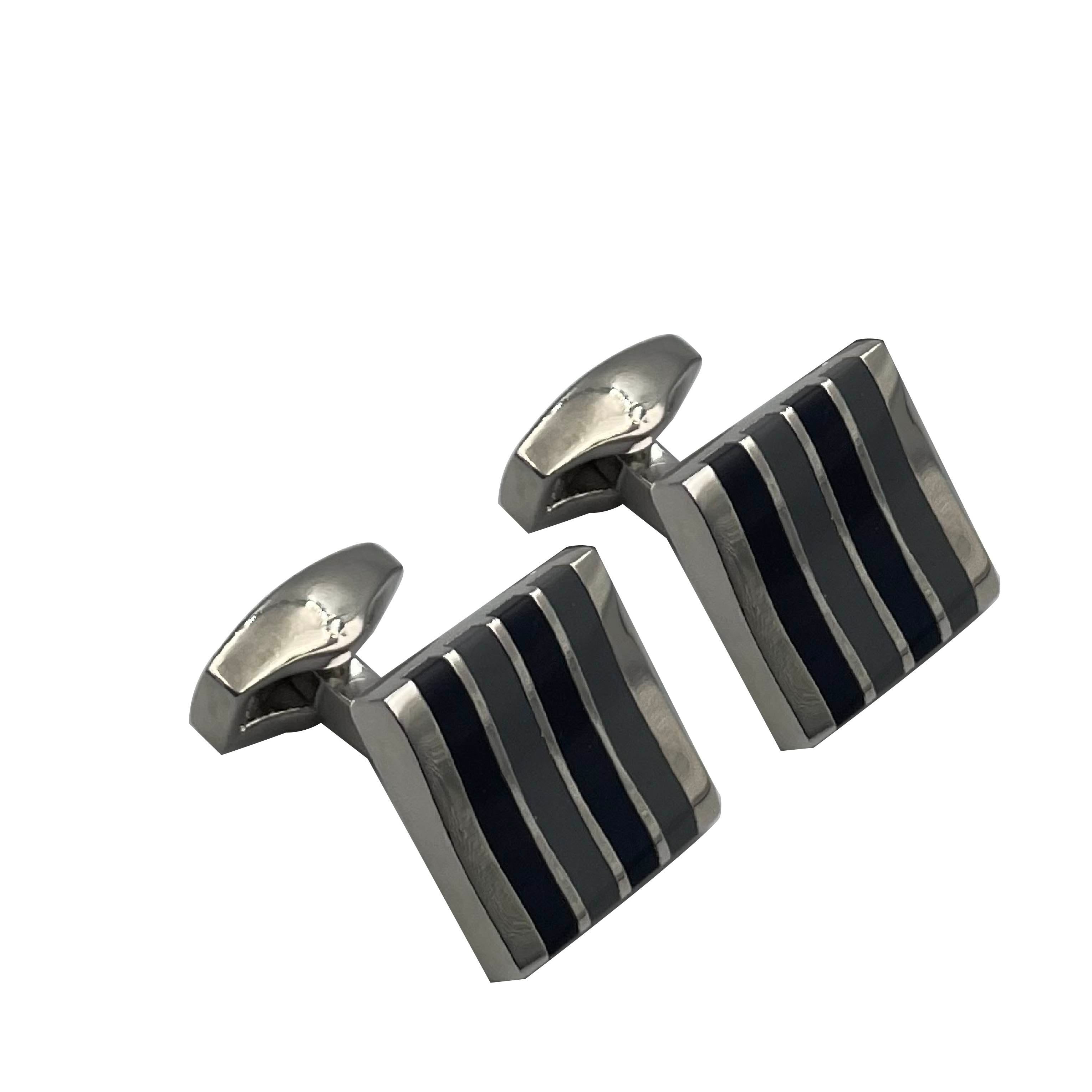 A pair of men's cufflinks with a rhodium finish and blue and grey polished enamel stripes.